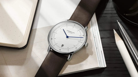 Naos leather strap movement detail